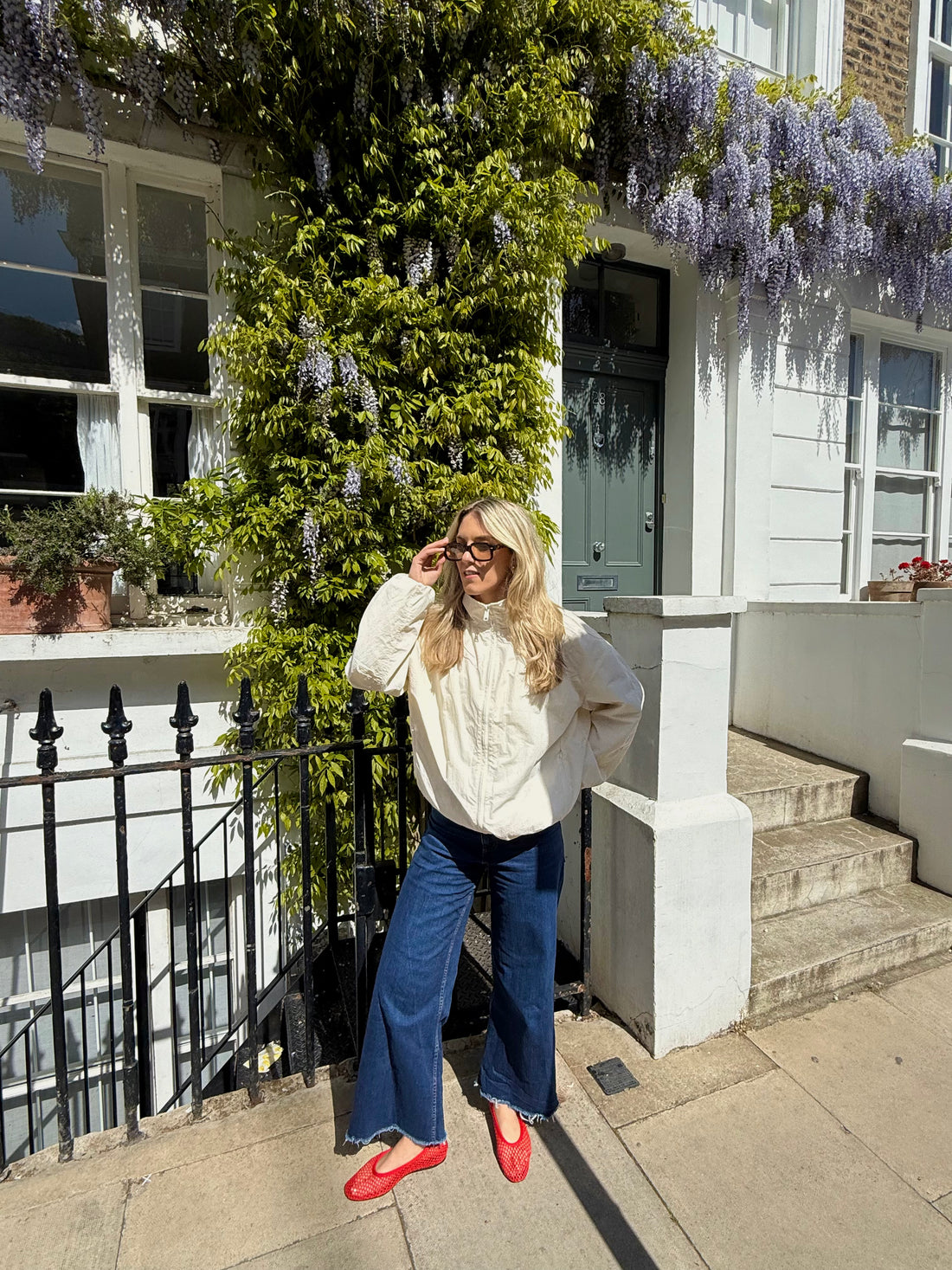 Peach & Flow founder outside a London townhouse